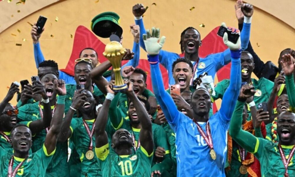 Senegal shows off AFCON trophy in defiance of title withdrawal