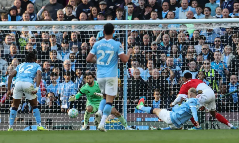 AFP 20260419 A8C86ZU v1 MidRes FblEngPrManCityArsenal