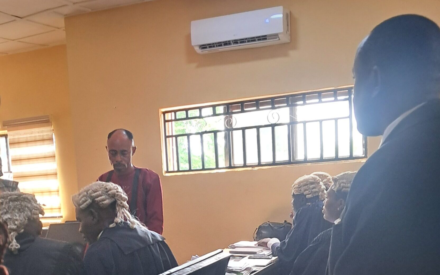 Amos Isah in court scaled e1778775465186