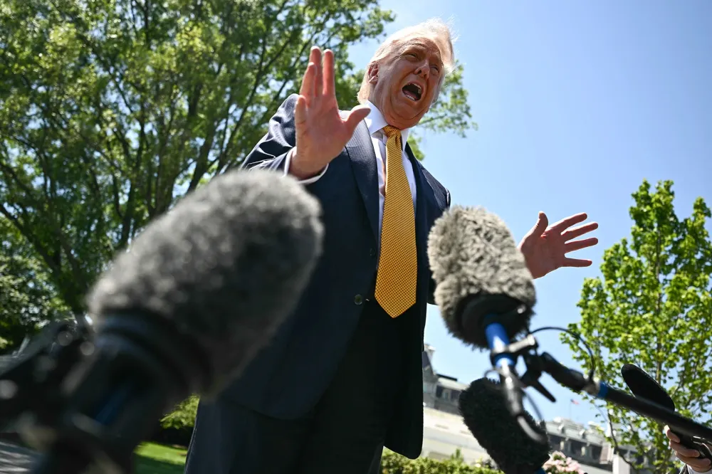 President Donald Trump calls reporter dumb person for White House.webp